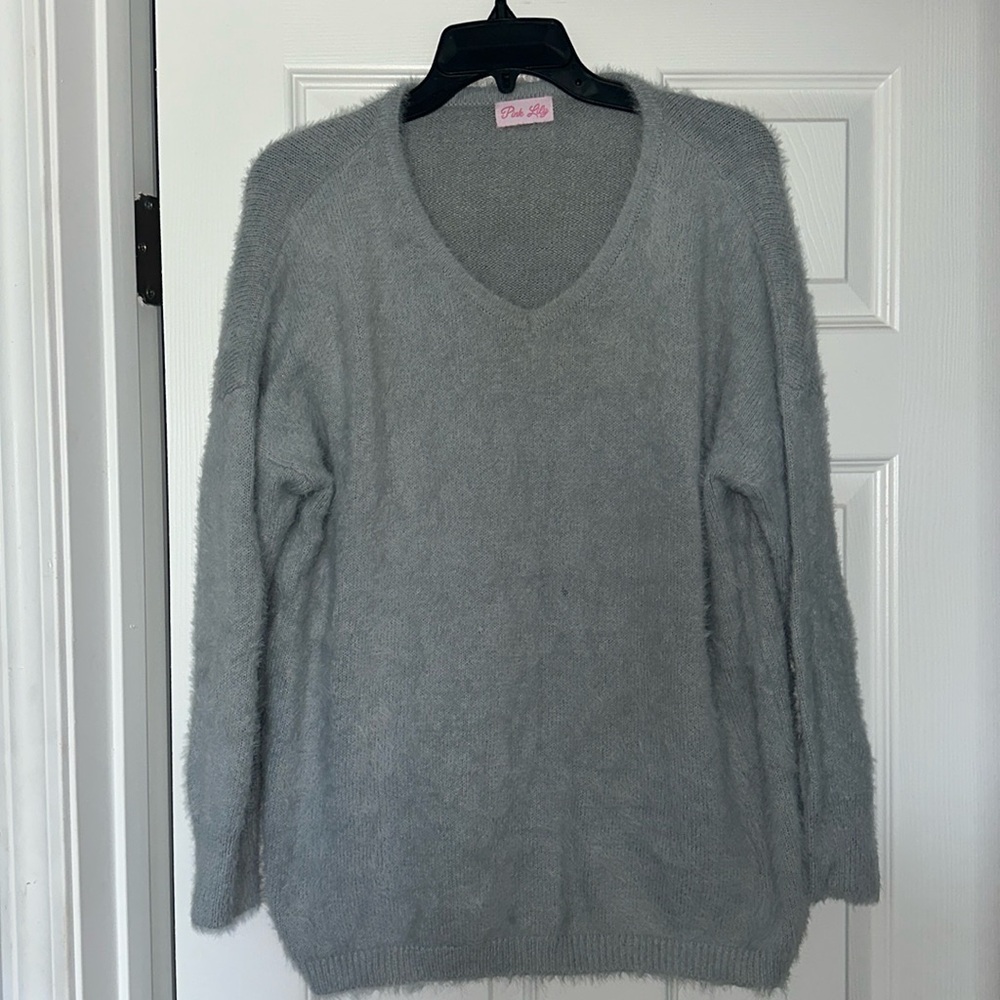 fuzzy blue-gray sweater